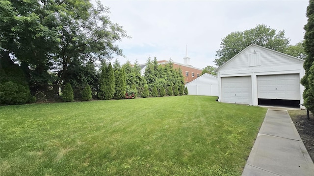 14436 32nd Ave, Flushing, NY 11354 - view of green lawn featuring an outdoor structure and a garage
