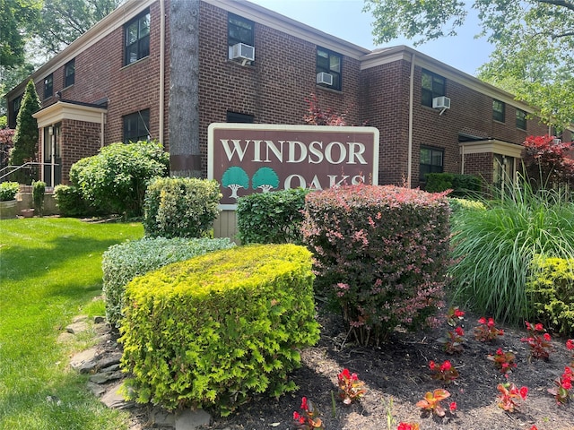 219-02 75th Ave Unit 2F, Oakland Gardens, NY 11364 - community sign featuring a yard
