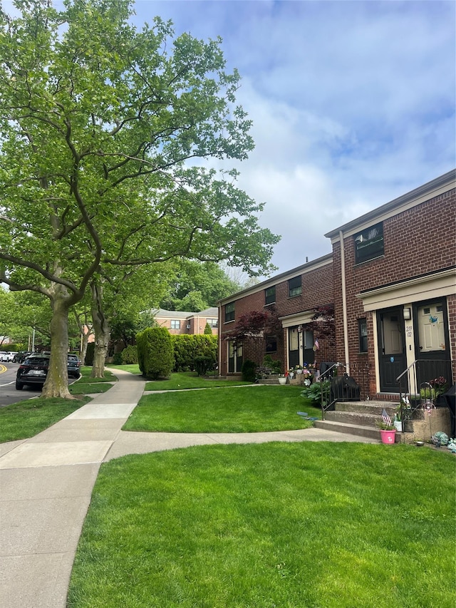 219-02 75th Ave Unit 2F, Oakland Gardens, NY 11364 - view of grassy yard