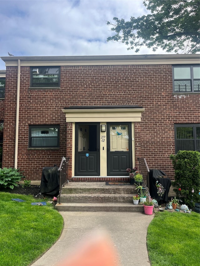 219-02 75th Ave Unit 2F, Oakland Gardens, NY 11364 - view of front of property with brick siding