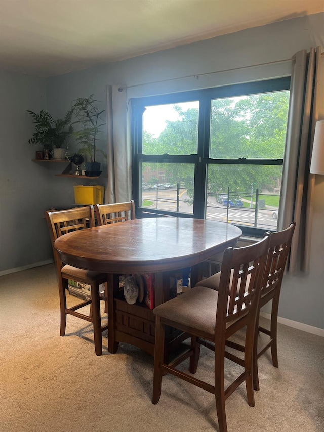 219-02 75th Ave Unit 2F, Oakland Gardens, NY 11364 - dining space with light carpet, plenty of natural light, and baseboards