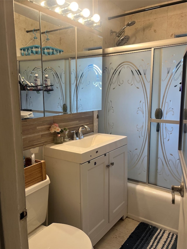 219-02 75th Ave Unit 2F, Oakland Gardens, NY 11364 - full bathroom with toilet, vanity, and enclosed tub / shower combo
