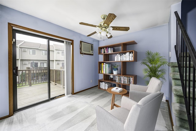 5306 Chelsea Cv N, Hopewell Junction, NY 12533 - sitting room featuring ceiling fan, a wall unit AC, stairs, and carpet flooring