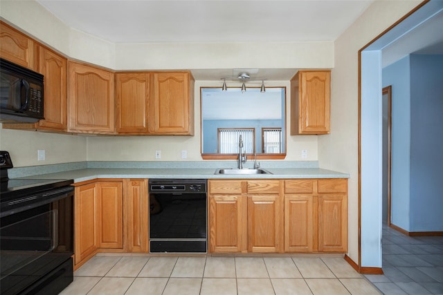 5306 Chelsea Cv N, Hopewell Junction, NY 12533 - kitchen featuring black appliances, light countertops, and light tile patterned floors