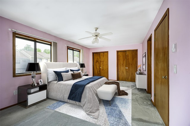 5306 Chelsea Cv N, Hopewell Junction, NY 12533 - bedroom with light carpet, multiple closets, and a ceiling fan