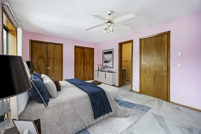 5306 Chelsea Cv N, Hopewell Junction, NY 12533 - bedroom featuring carpet, two closets, a ceiling fan, and ensuite bathroom