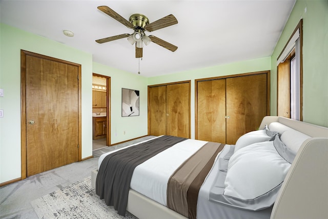 5306 Chelsea Cv N, Hopewell Junction, NY 12533 - bedroom featuring light colored carpet, two closets, ensuite bathroom, and ceiling fan