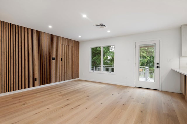 8 Junard Dr, Roslyn, NY 11576 - unfurnished room with light wood-style floors and recessed lighting