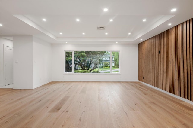 8 Junard Dr, Roslyn, NY 11576 - unfurnished room featuring a tray ceiling, light wood finished floors, and recessed lighting