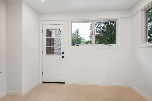 8 Junard Dr, Roslyn, NY 11576 - doorway featuring baseboards