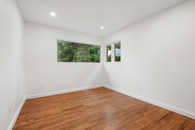 8 Junard Dr, Roslyn, NY 11576 - spare room with light wood-style floors and recessed lighting