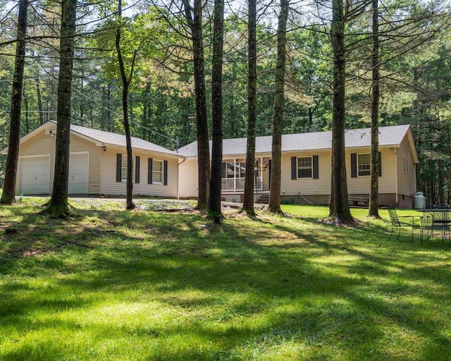 12 Summit Dr, Eldred, NY 12792 - back of property with an outbuilding, a lawn, and a detached garage