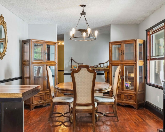 12 Summit Dr, Eldred, NY 12792 - dining space featuring a chandelier, a textured ceiling, and dark wood-style flooring