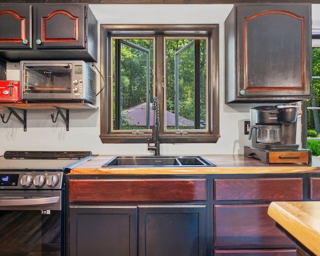 12 Summit Dr, Eldred, NY 12792 - kitchen featuring stainless steel gas range oven and light countertops