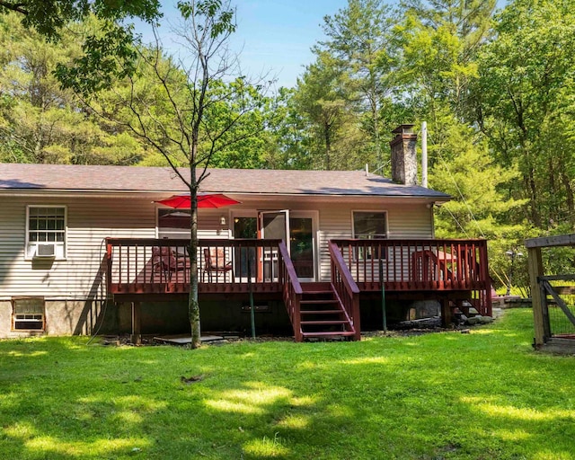 12 Summit Dr, Eldred, NY 12792 - back of property featuring a wooden deck, a lawn, a chimney, and roof with shingles