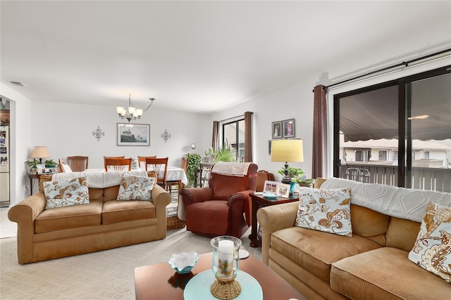 96 Molly Pitcher Ln Unit H, Yorktown Heights, NY 10598 - carpeted living room with a chandelier