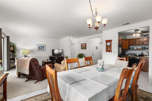 96 Molly Pitcher Ln Unit H, Yorktown Heights, NY 10598 - dining space featuring light tile patterned floors, a chandelier, and ceiling fan
