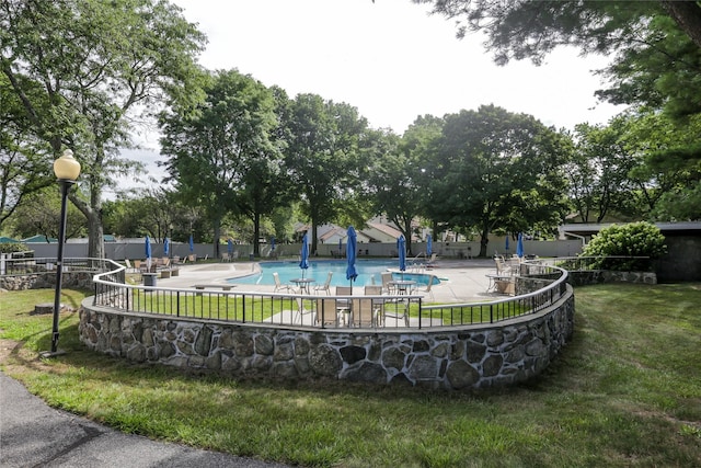 96 Molly Pitcher Ln Unit H, Yorktown Heights, NY 10598 - view of community featuring a swimming pool and a patio