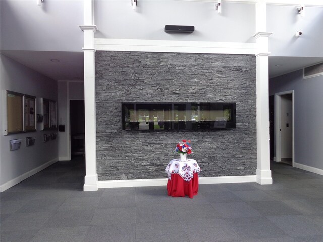 96 Molly Pitcher Ln Unit H, Yorktown Heights, NY 10598 - detailed view of a glass covered fireplace and a security system