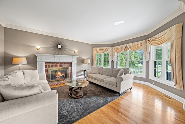 6 Long Meadow Way, Goshen, NY 10924 - living room with crown molding, wood finished floors, and a brick fireplace