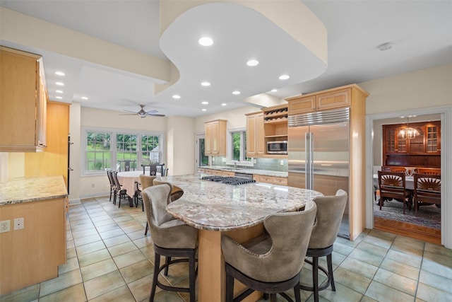 6 Long Meadow Way, Goshen, NY 10924 - kitchen featuring stainless steel appliances, light brown cabinetry, ceiling fan, light tile patterned floors, and recessed lighting