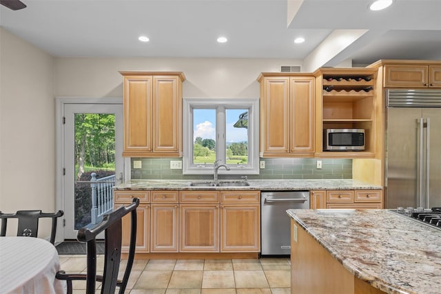 6 Long Meadow Way, Goshen, NY 10924 - kitchen with stainless steel appliances, tasteful backsplash, light stone countertops, open shelves, and recessed lighting