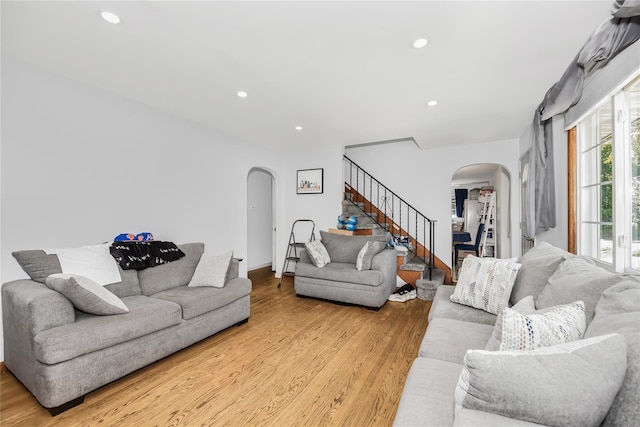 13 Valley View Dr, New Windsor, NY 12553 - living room featuring arched walkways, stairway, light wood finished floors, and recessed lighting