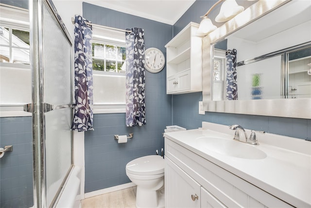 13 Valley View Dr, New Windsor, NY 12553 - full bath featuring vanity, tile walls, and bath / shower combo with glass door