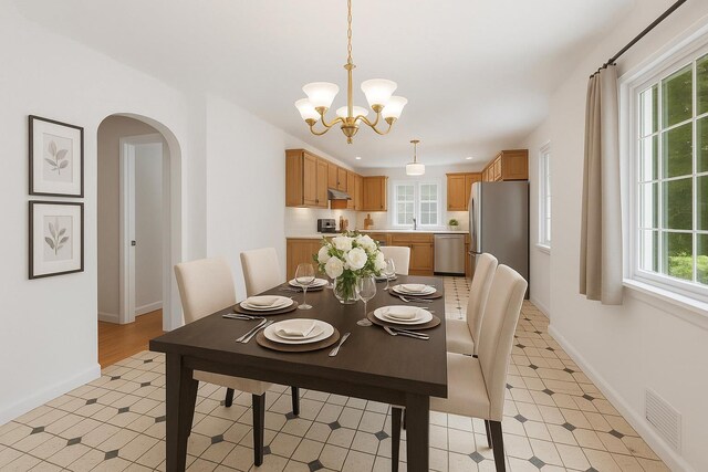 13 Valley View Dr, New Windsor, NY 12553 - dining room with arched walkways, a chandelier, and recessed lighting
