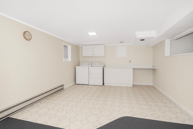 13 Valley View Dr, New Windsor, NY 12553 - washroom with a baseboard heating unit, cabinet space, independent washer and dryer, light flooring, and ornamental molding