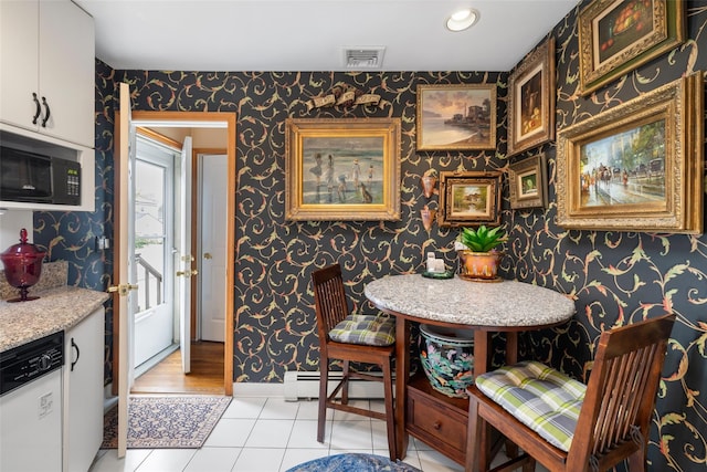 12 Roosevelt Pl, Massapequa, NY 11758 - dining area featuring wallpapered walls, light tile patterned floors, a baseboard heating unit, baseboards, and recessed lighting