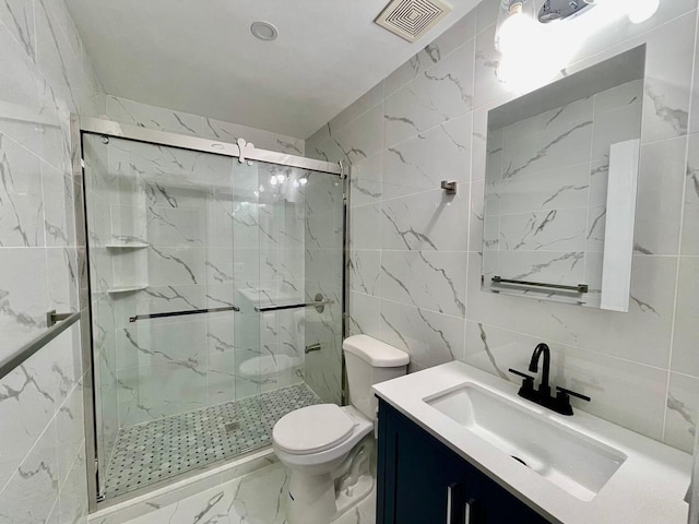 132-06 57th Rd, Flushing, NY 11355 - bathroom with tile walls, vanity, marble finish floors, a marble finish shower, and toilet