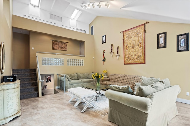 8 Ellis Dr, Syosset, NY 11791 - living room with stairway, high vaulted ceiling, and track lighting
