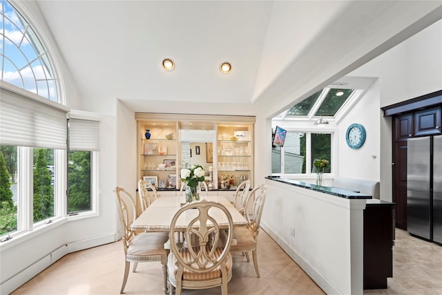 8 Ellis Dr, Syosset, NY 11791 - dining space with healthy amount of natural light, recessed lighting, and high vaulted ceiling