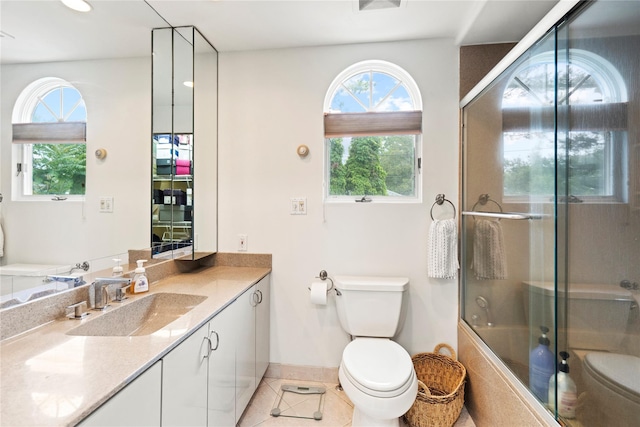 8 Ellis Dr, Syosset, NY 11791 - full bathroom featuring tile patterned flooring, vanity, combined bath / shower with glass door, and recessed lighting