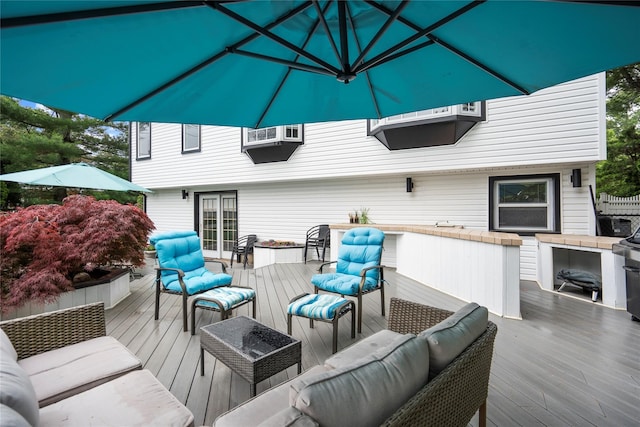 8 Ellis Dr, Syosset, NY 11791 - wooden deck featuring outdoor lounge area