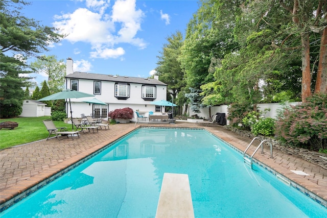 8 Ellis Dr, Syosset, NY 11791 - back of house with a chimney, a patio, a fenced backyard, and outdoor dining area