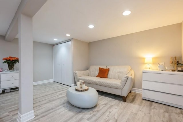 532 7th St, West Hempstead, NY 11552 - sitting room with light wood finished floors and recessed lighting
