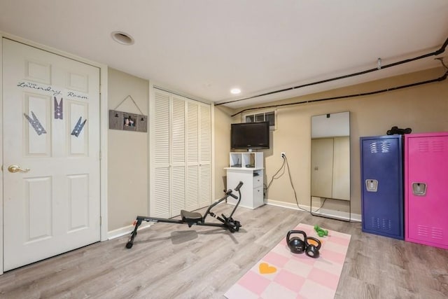 532 7th St, West Hempstead, NY 11552 - exercise area featuring wood finished floors