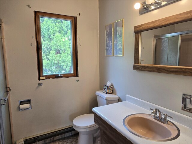 18 Laura Ct, Nesconset, NY 11767 - full bath with a baseboard heating unit, a stall shower, and vanity