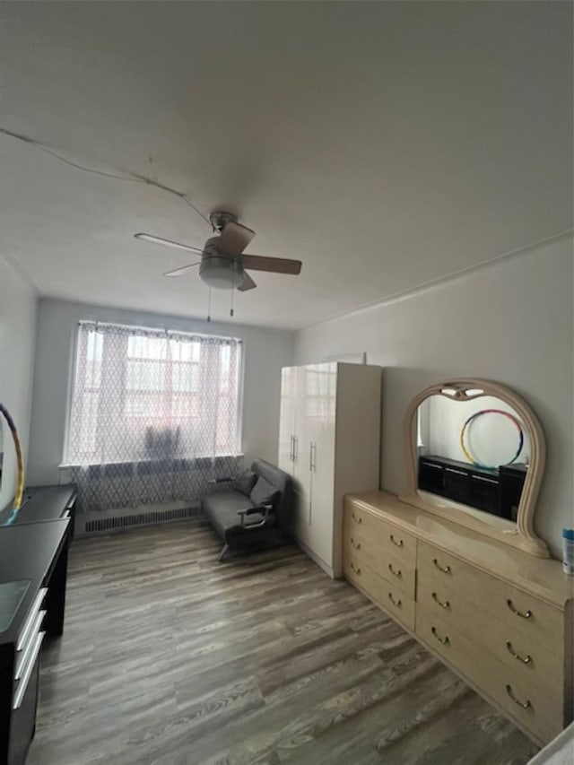 3338 Parsons Blvd Unit 6G, Flushing, NY 11354 - sitting room with wood finished floors and ceiling fan
