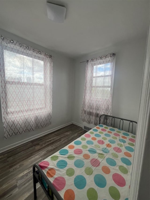 3338 Parsons Blvd Unit 6G, Flushing, NY 11354 - bedroom featuring dark wood-style flooring and multiple windows