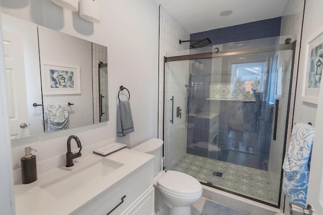 318 Sheep Pasture Rd, East Setauket, NY 11733 - bathroom featuring toilet, vanity, and a shower stall