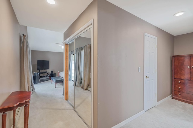 318 Sheep Pasture Rd, East Setauket, NY 11733 - corridor featuring light colored carpet and baseboards