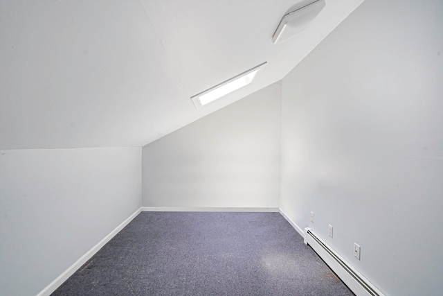 318 Sheep Pasture Rd, East Setauket, NY 11733 - additional living space featuring baseboard heating, lofted ceiling, and carpet floors