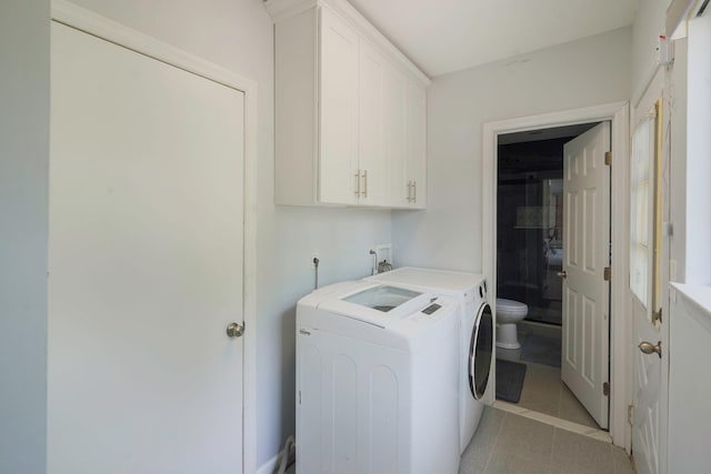 318 Sheep Pasture Rd, East Setauket, NY 11733 - washroom with independent washer and dryer and light tile patterned floors