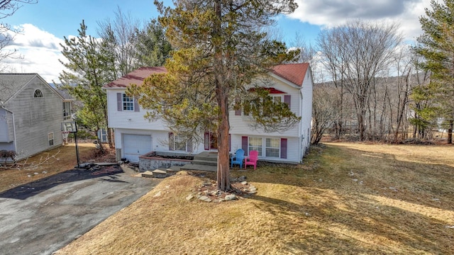7 Tufts Ln, Highland Mills, NY 10930 - view of front facade featuring an attached garage and driveway