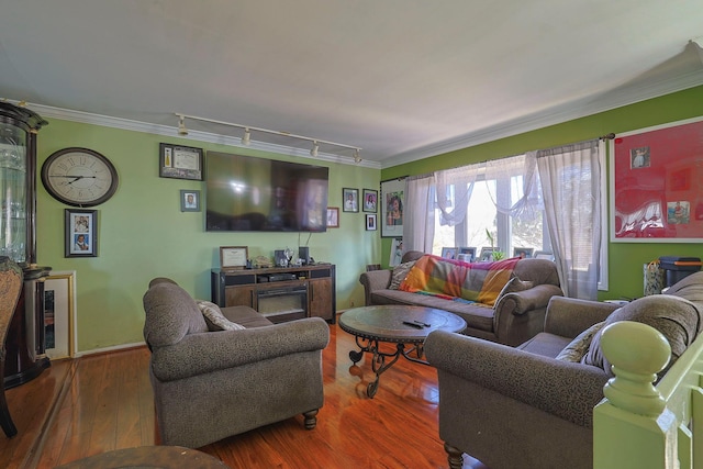 7 Tufts Ln, Highland Mills, NY 10930 - living room featuring ornamental molding, wood finished floors, and track lighting