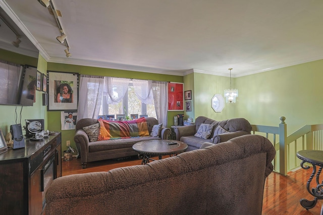 7 Tufts Ln, Highland Mills, NY 10930 - living area with a chandelier, wood finished floors, rail lighting, and crown molding
