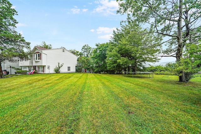 7 Tufts Ln, Highland Mills, NY 10930 - view of grassy yard featuring a trampoline